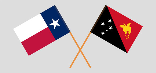 Crossed flags of the State of Texas and Papua New Guinea. Official colors. Correct proportion