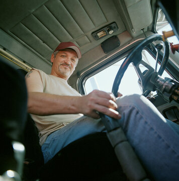 Portrait of happy truck driver