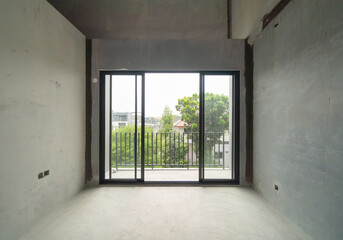 Empty under construction room in home or house with space on site. Interior. Old unfurnished room rental property, living space units. lifestyle. Renovation.