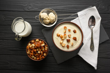 Creamy cauliflower soup with homemade croutons.