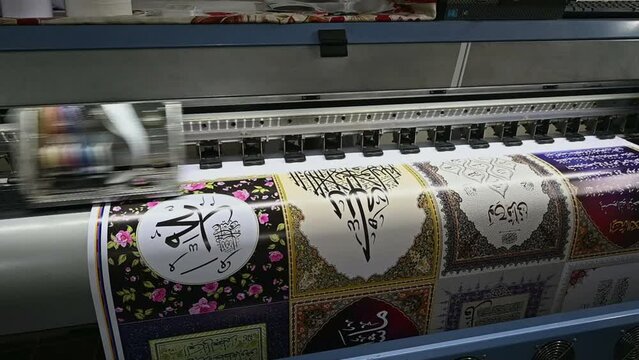 Kolhapur, Maharashtra - June 24, 2020: Large format colorful Eco-solvent printing during work at the printing house.