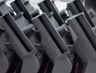 Models printed on 3D printer. Objects details printed on 3D printer from plastic close-up. Prototypes of shapes made by 3d printer. Concept new modern printing technology