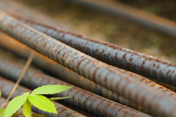 Cast iron with some rust due to corrosion. Picture taken with a blur background