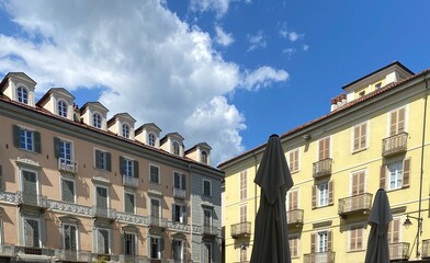 facade of the building with clouds
