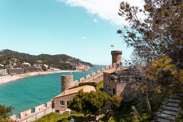 Fototapeta na wymiar Aerial view of fortress in Tossa de Mar, Costa Brava, Spain. Historical coastal old town on a hill near Mediterranean Sea