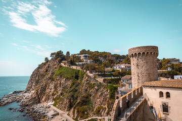 Fototapeta na wymiar Aerial view of fortress in Tossa de Mar, Costa Brava, Spain. Historical coastal old town on a hill near Mediterranean Sea
