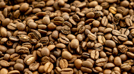 Coffee beans background. Reduction of the amount of coffee in the world, the disappearance of coffee