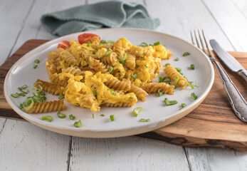 Whole wheat noodles with scrambled eggs. Healthy and cheap meal