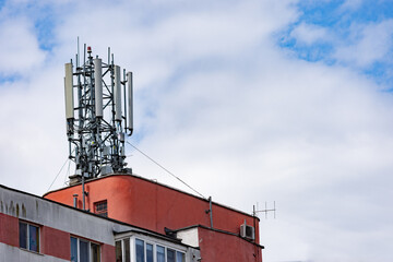 5G antenna for network signal on mobile devices for a faster data transfer, installed on a roof - 513002034