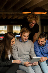 Having a discussion about the plans and ideas for the company in the cafe