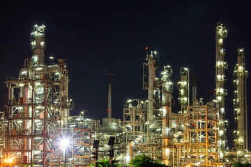 Oil​ refinery​ plant and tower column of Petrochemistry industry in tank oil​ and​ gas​ ​industrial with​ cloud​