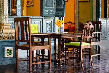 Table and chairs in front of the restaurant;