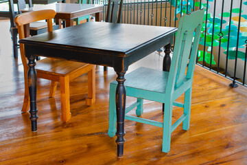 Table and chairs in front of the restaurant;