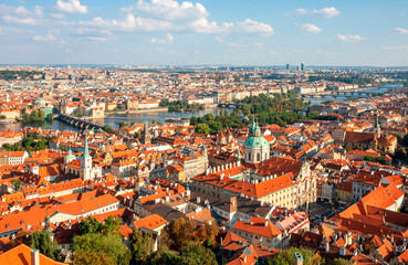 Naklejka na ściany i meble Aerial view of houses and roofs of Prague old city town.