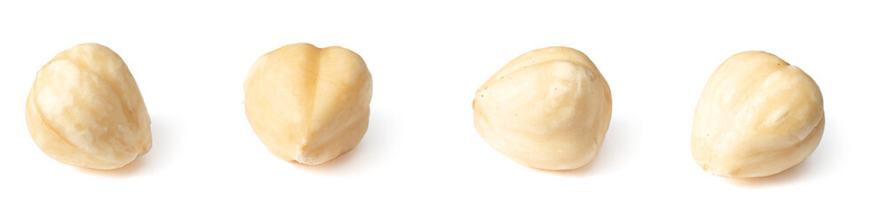 Shelled hazelnuts isolated on white background.