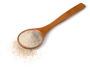 Raw rye flour in the wooden spoon, isolated on white background.
