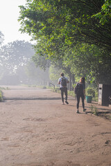 Defocused photo of People walking in front of Borobudur temple during morning