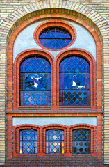 Fototapeta premium Architectural details of the Catholic Church of Our Lady of the Rosary built in 1895 in the neo-Gothic style in Bajtkowo in Masuria, Poland.
