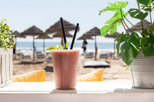 Product Photo: Vegetable Smoothie on the Beach on a Sunny Day
