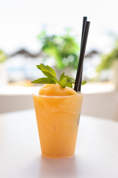 product photo Vegetable smoothie at the beach on a sunny day