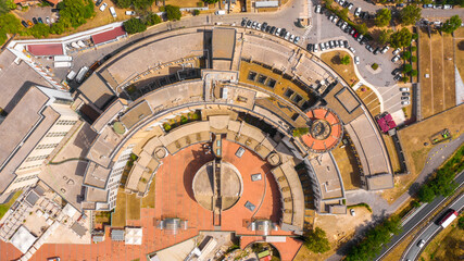 Perpendicular aerial view on a semicircular building.