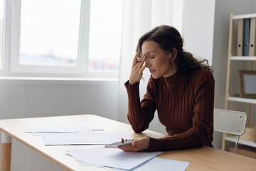 Upset unhappy suffering sad frustrated curly adorable woman doing facepalm touch forehead have serious financial problems bad relationships troubles at work worried about debt notification. Copy space