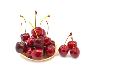 Fresh summer dark red sweet cherry on a white background. Isolated.
