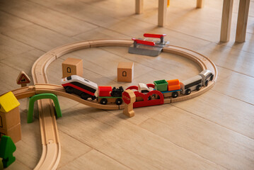Wooden toy train on track