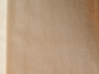 Rough textured surface of old paper close-up.  Old brown gradient vintage texture paper canvas background. Wallpaper for your luxury design