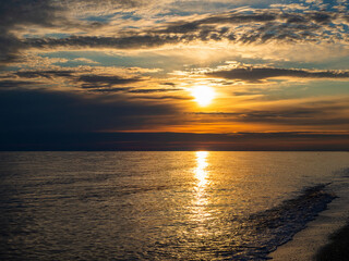 Picturesque view of the sea against the sky during sunset. Beautiful sunset on the sea beach
