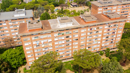 Aerial view on a group of popular low-cost housing. This buildings are in the Spinaceto district in Rome, Italy.