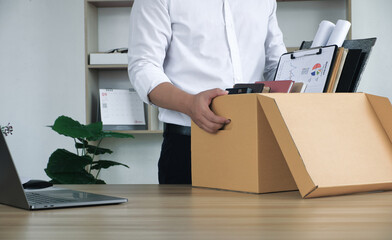 Collecting belongings and documents. In the concept of resignation. job transfer dismissal big...