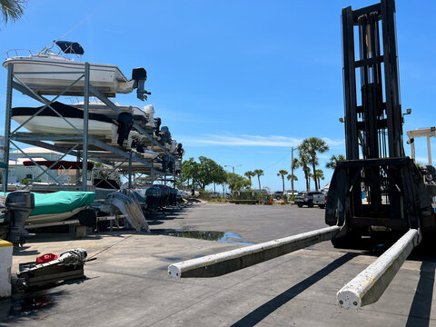 Closeup shot of boat lift and stacked boats in Florida, USA