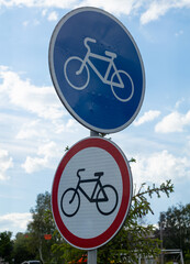 the contradiction of bicycle signs