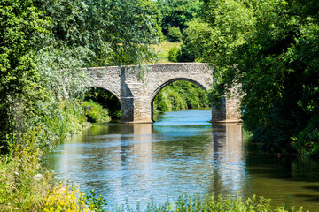 Fototapeta na wymiar Teston Bridge over the River Medway near Maidstone in Kent, England