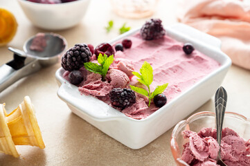 Homemade pink healthy sorbet with banana and berry ice cream summer refresing treat - obrazy, fototapety, plakaty