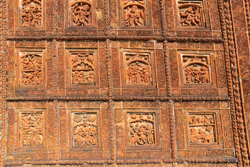 Famous terracotta (fired clay of a brownish-red colour, used as ornamental building material) motif artworks at Madanmohan Temple, Bishnupur, West Bengal, India. UNESCO heritage site of India.