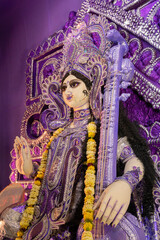 Idol of Goddess Saraswati at Kolkata, West Bengal, India. Saraswati is Hindu goddess of knowledge, music, art, wisdom, and learning. Worshipping is done to get divine blessing to achieve excellence.