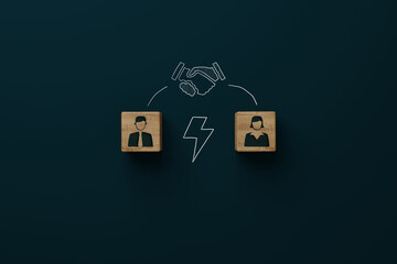 Wooden blocks with an icon of a man, woman, lightning bolt and shaking hands with consent. Divorce, mediation concept. Troubleshooting by a mediator.