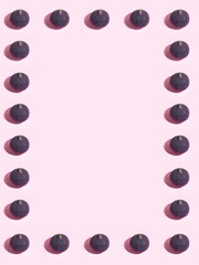 Colorful fruit pattern of fresh figs on purple pastel background, top view, flat lay