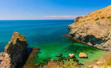 Seashore from aerial view. Azure water coastline. Turquoise water and yellow sand