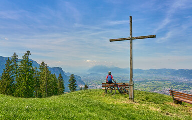 nice senior woman riding her electric mountain bike  in the Bregenzer Wald mountain range above Dornbirn and Rhein valley, in Vorarlberg, Austria