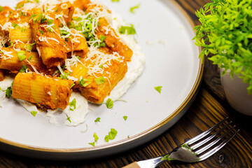 Pasta with cheese sauce. cooking noodles. European cuisine