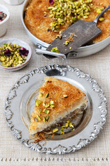 Traditional Arabian Kanafe with Cream and Cheese with pistachio nuts