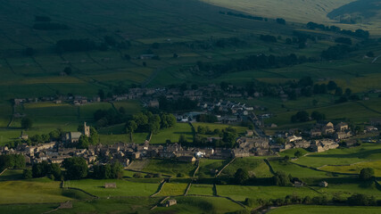 Fototapeta na wymiar An Aerial view of Hawes a market town and civil parish in the Richmondshire district of North Yorkshire, England, at the head of Wensleydale in the Yorkshire Dales
