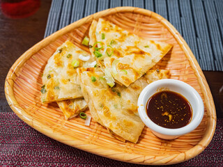 Close up shot of fried green onions pancake