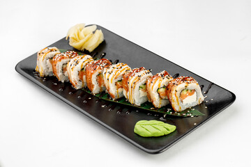 Sushi Canada on black plate and white background
