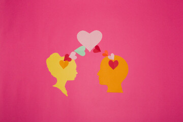 hearts come out of the heads and merge into one heart that can be copy space, creative design,...