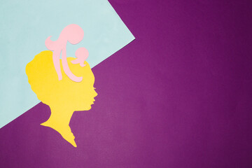 yellow women's paper head, creative art design an adult who is still a child at heart and in need of love, purple-blue background, creative art design, copy space