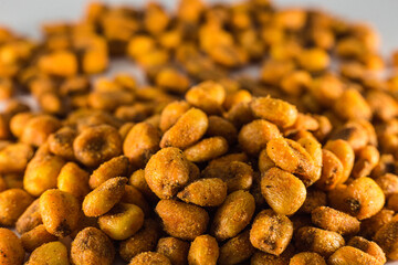fried corn on gray background